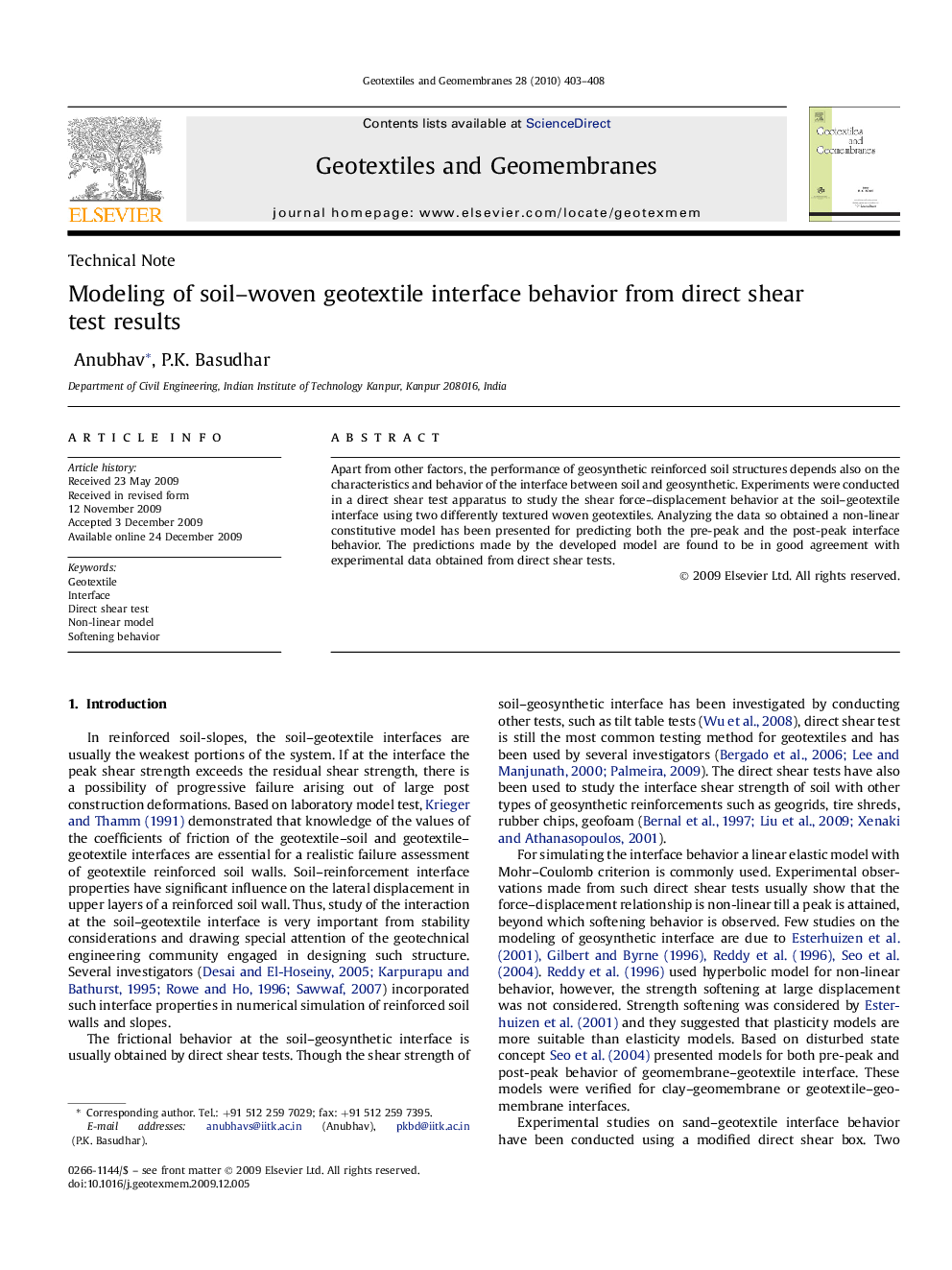 Modeling of soil–woven geotextile interface behavior from direct shear test results