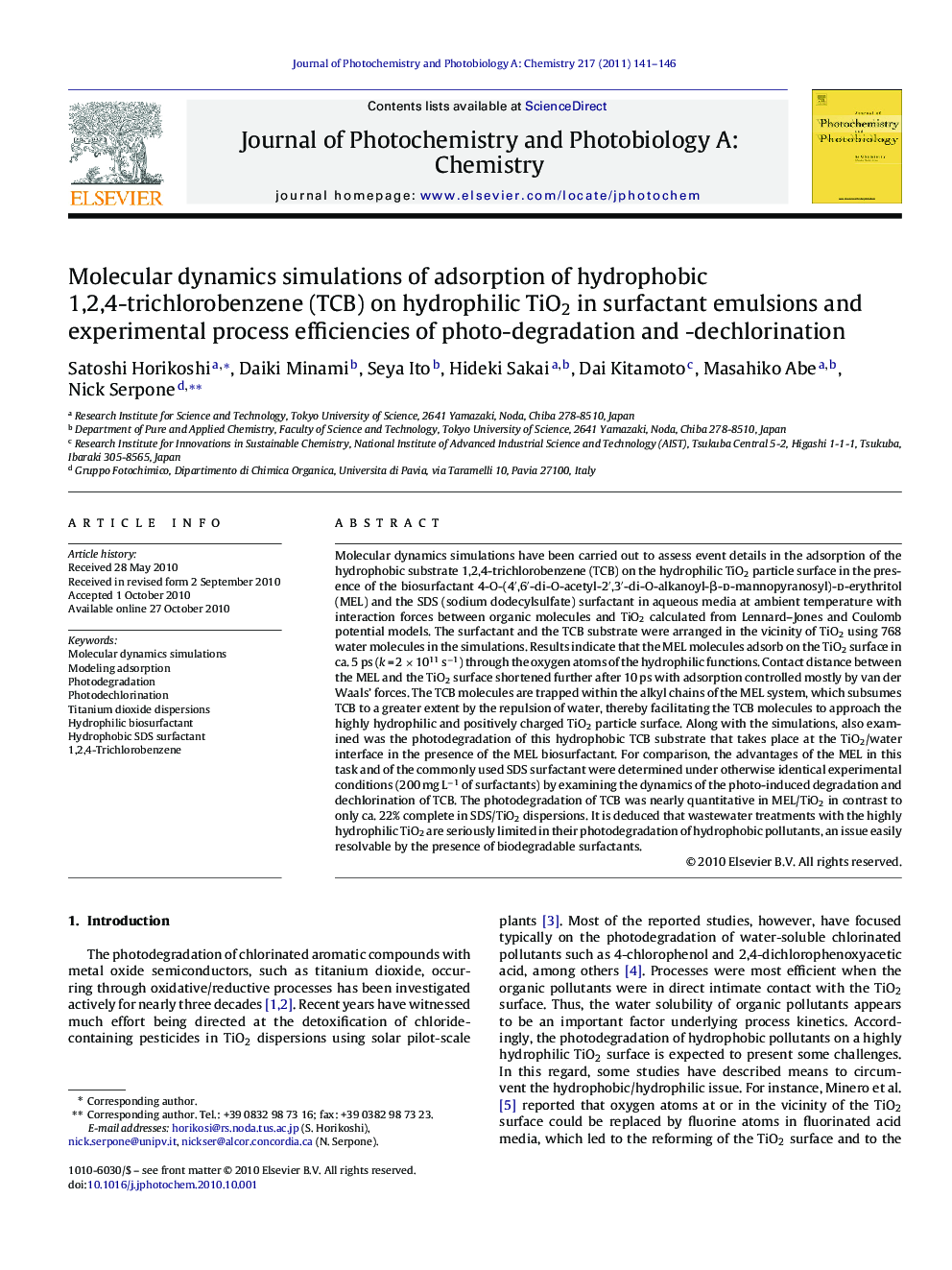 Molecular dynamics simulations of adsorption of hydrophobic 1,2,4-trichlorobenzene (TCB) on hydrophilic TiO2 in surfactant emulsions and experimental process efficiencies of photo-degradation and -dechlorination