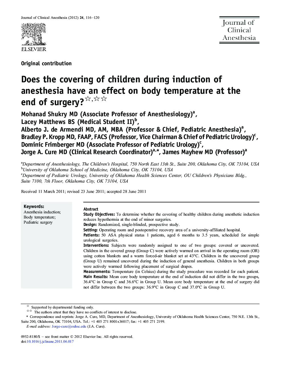 Does the covering of children during induction of anesthesia have an effect on body temperature at the end of surgery? 