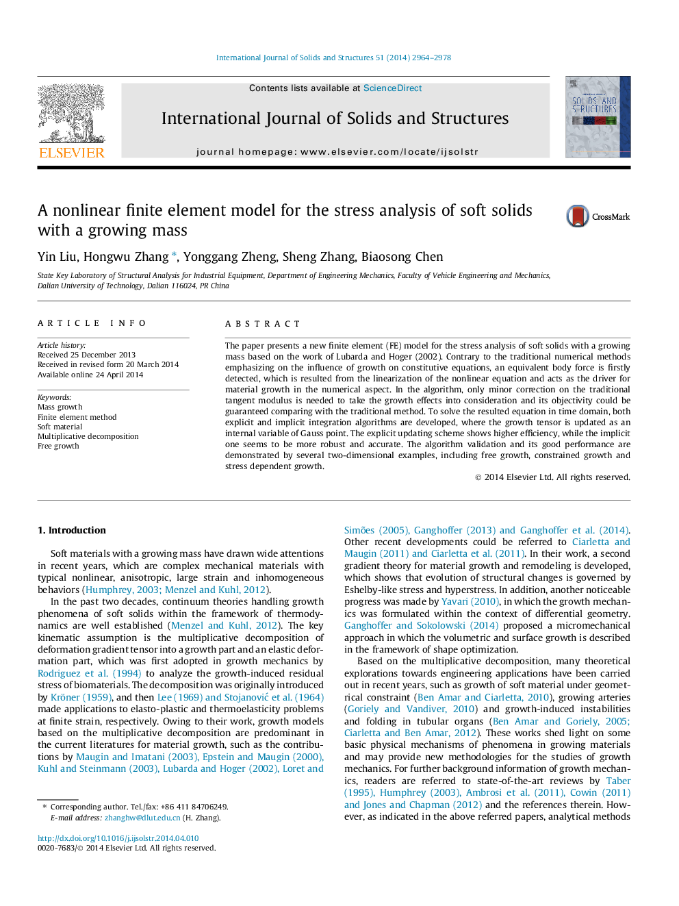 A nonlinear finite element model for the stress analysis of soft solids with a growing mass