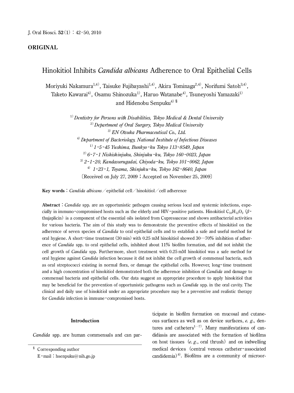 Hinokitiol Inhibits Candida albicans Adherence to Oral Epithelial Cells