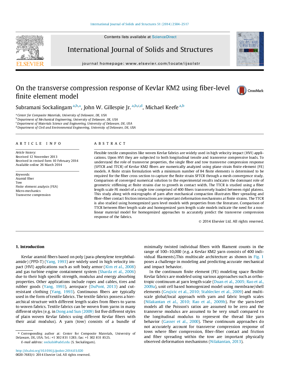 On the transverse compression response of Kevlar KM2 using fiber-level finite element model