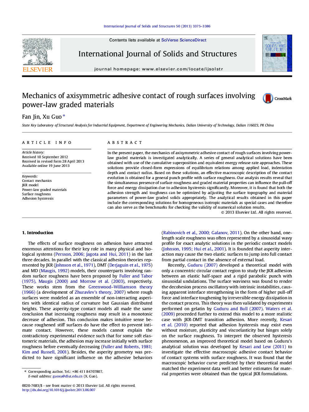 Mechanics of axisymmetric adhesive contact of rough surfaces involving power-law graded materials