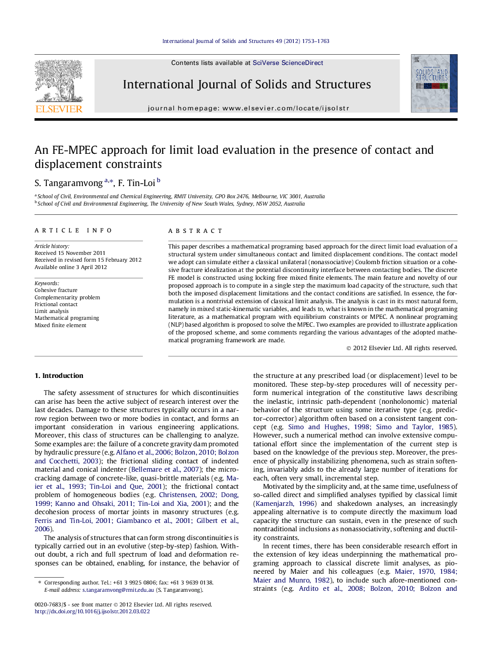 An FE-MPEC approach for limit load evaluation in the presence of contact and displacement constraints