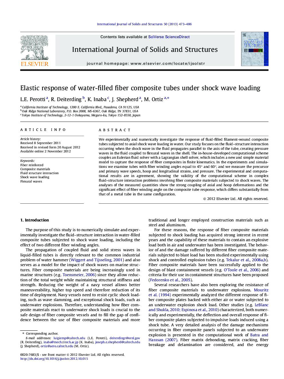 Elastic response of water-filled fiber composite tubes under shock wave loading