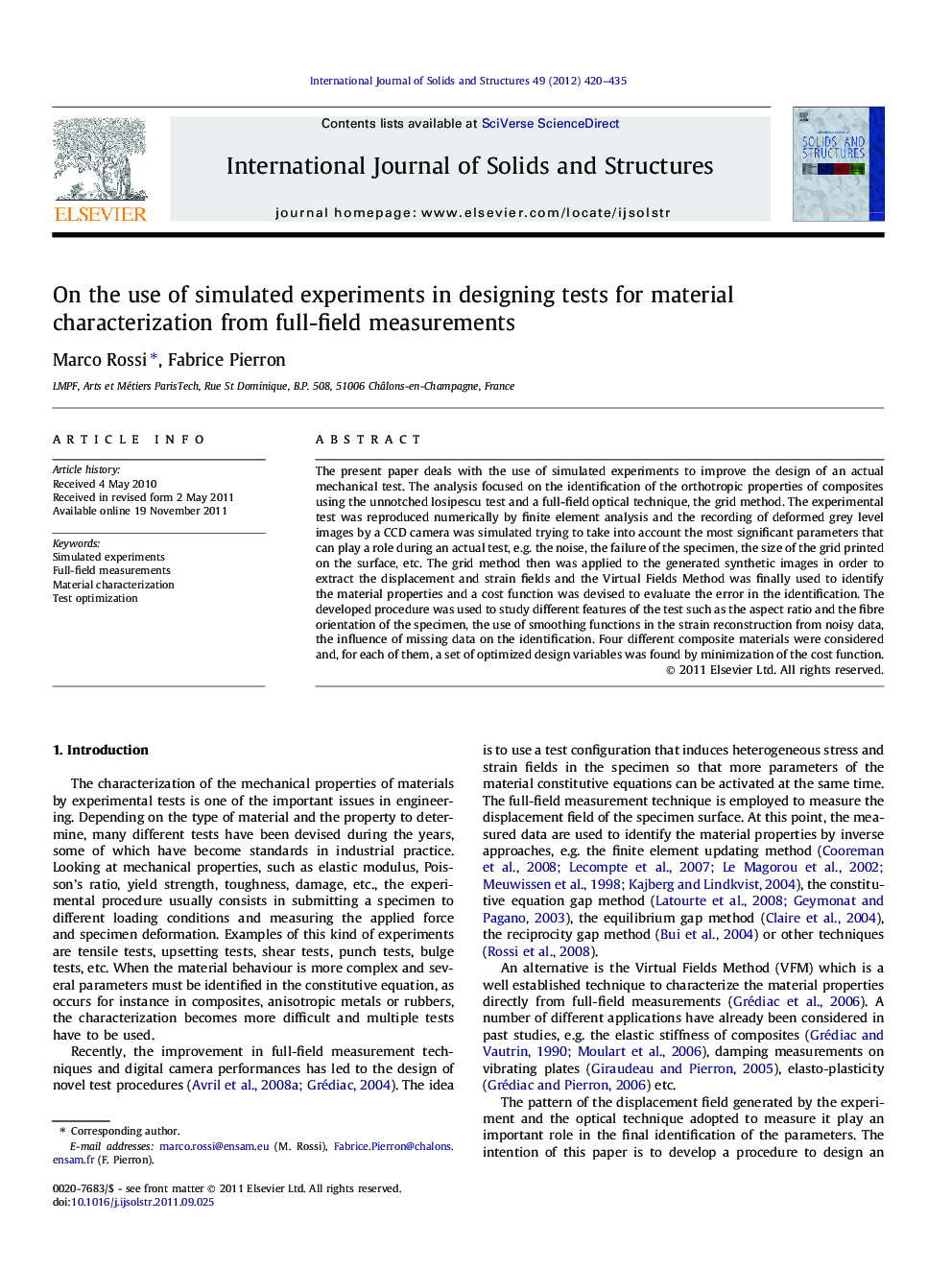 On the use of simulated experiments in designing tests for material characterization from full-field measurements