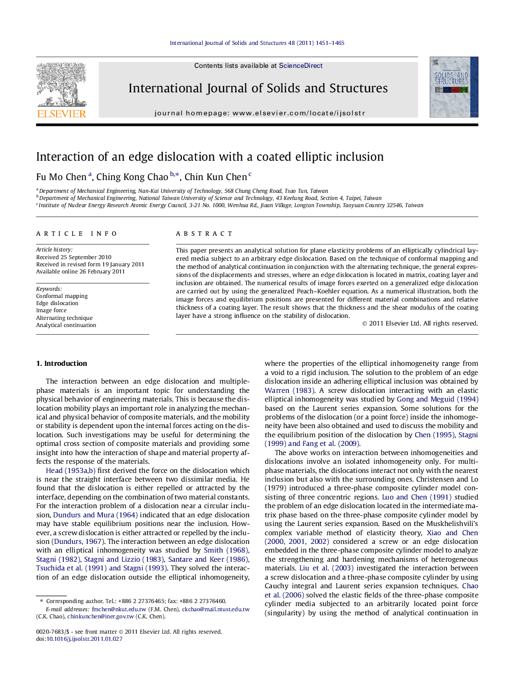 Interaction of an edge dislocation with a coated elliptic inclusion