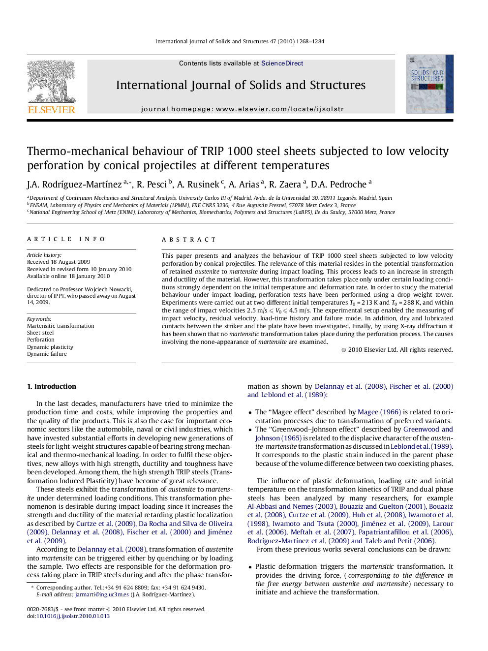 Thermo-mechanical behaviour of TRIP 1000 steel sheets subjected to low velocity perforation by conical projectiles at different temperatures