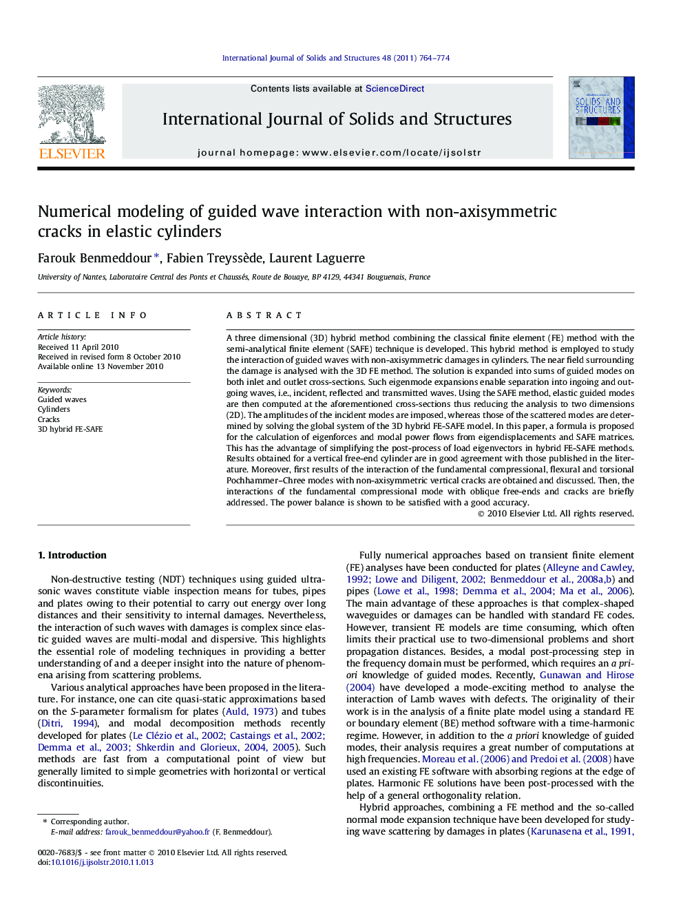 Numerical modeling of guided wave interaction with non-axisymmetric cracks in elastic cylinders