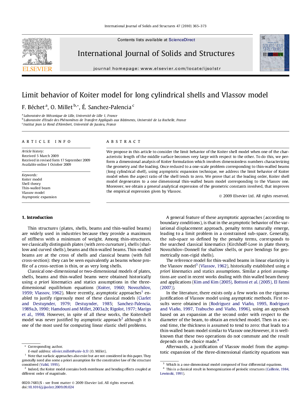 Limit behavior of Koiter model for long cylindrical shells and Vlassov model