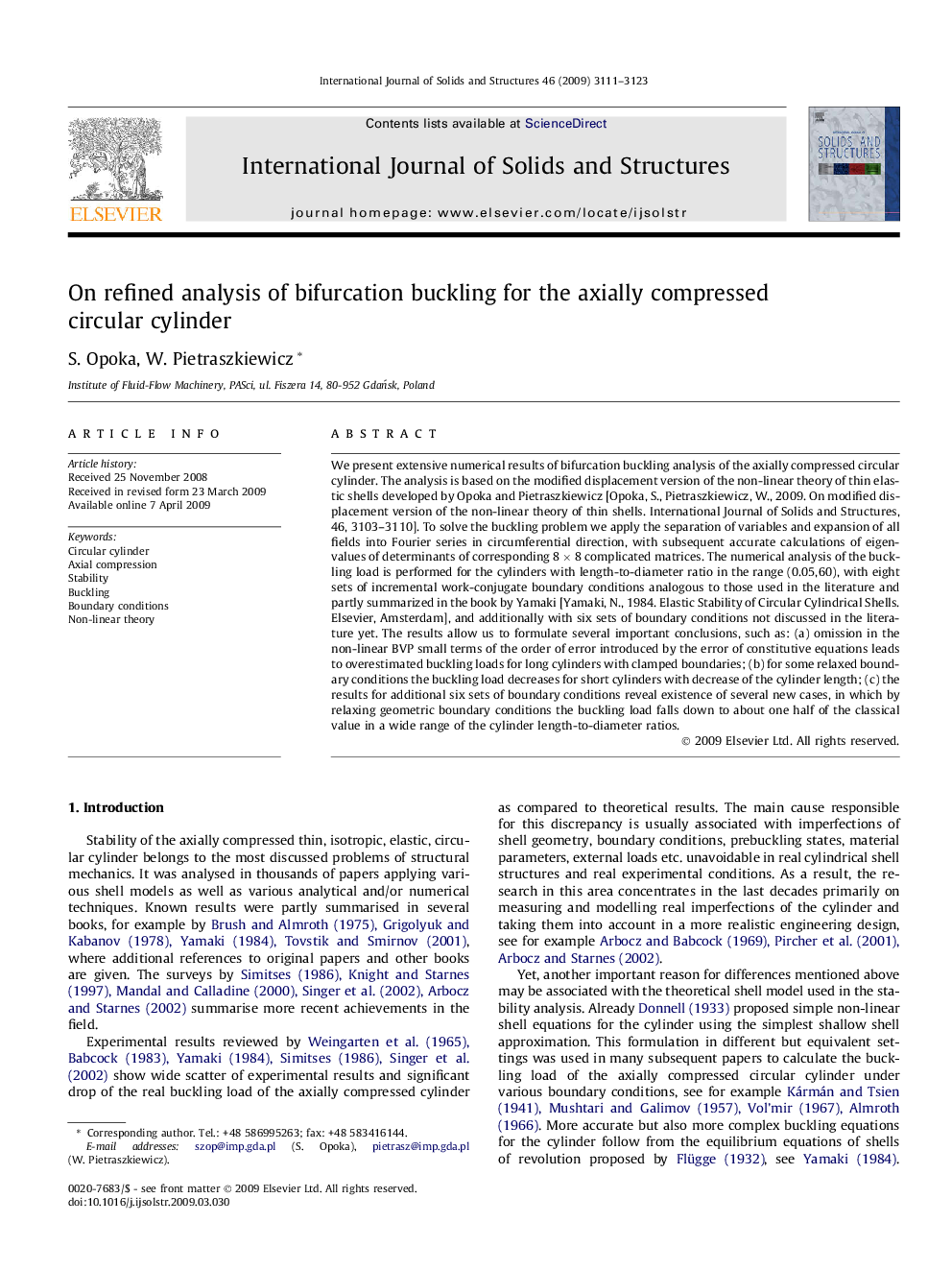 On refined analysis of bifurcation buckling for the axially compressed circular cylinder