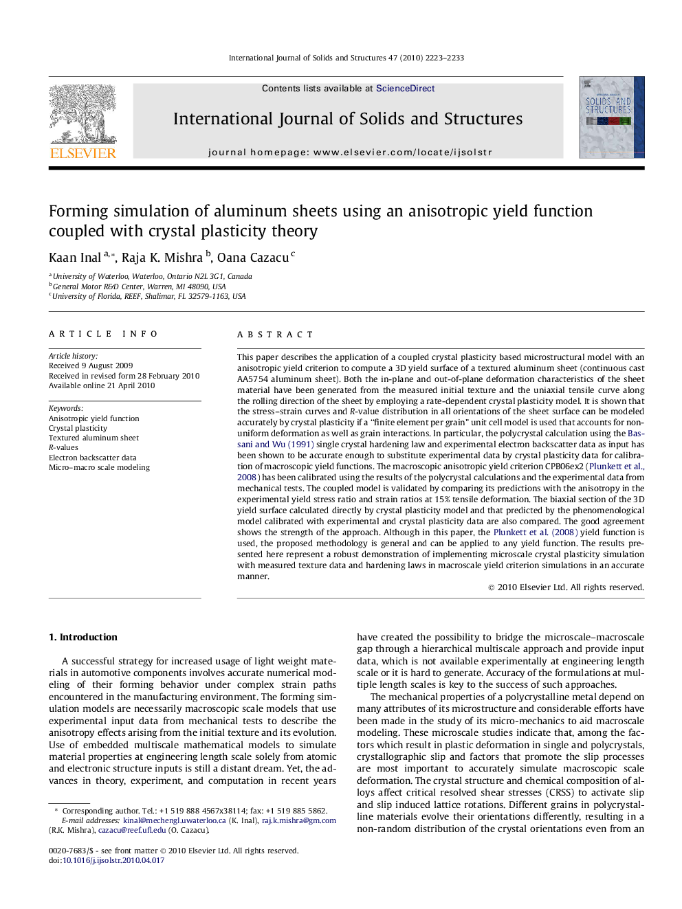 Forming simulation of aluminum sheets using an anisotropic yield function coupled with crystal plasticity theory