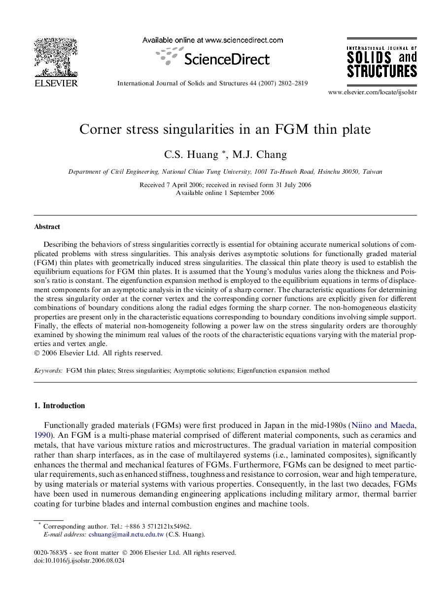 Corner stress singularities in an FGM thin plate