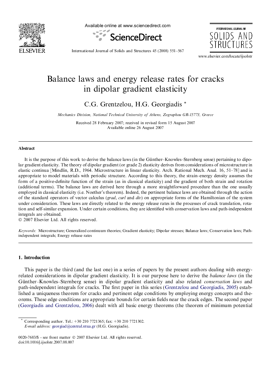 Balance laws and energy release rates for cracks in dipolar gradient elasticity