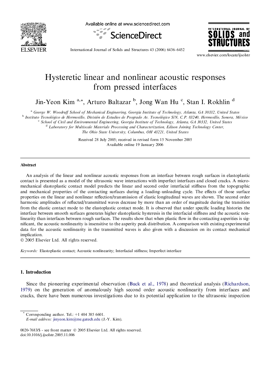 Hysteretic linear and nonlinear acoustic responses from pressed interfaces