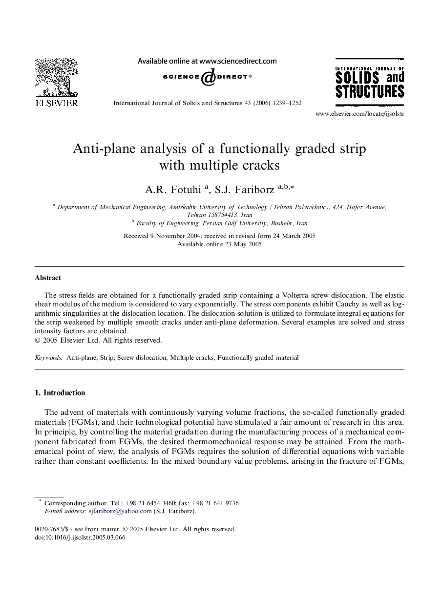 Anti-plane analysis of a functionally graded strip with multiple cracks