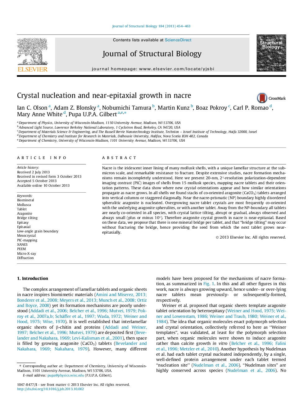 Crystal nucleation and near-epitaxial growth in nacre