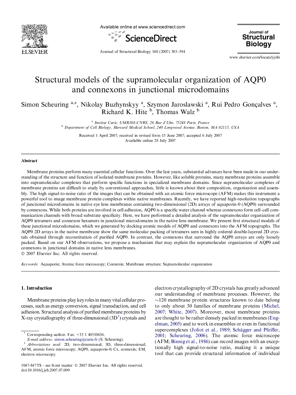 Structural models of the supramolecular organization of AQP0 and connexons in junctional microdomains