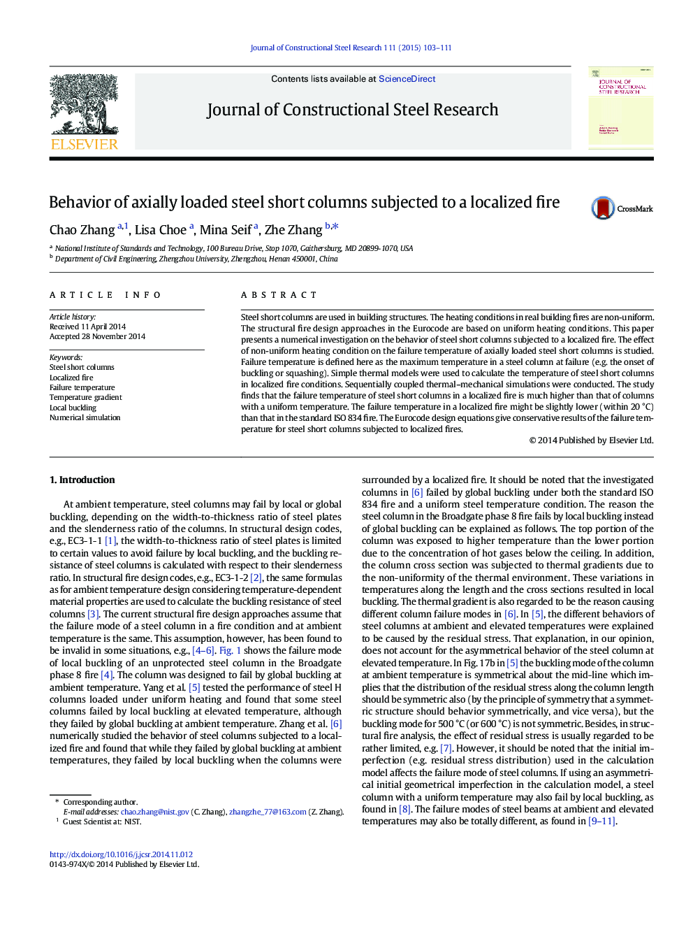 Behavior of axially loaded steel short columns subjected to a localized fire