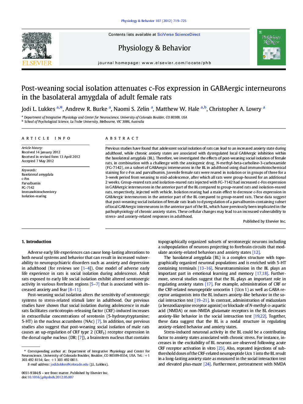 Post-weaning social isolation attenuates c-Fos expression in GABAergic interneurons in the basolateral amygdala of adult female rats