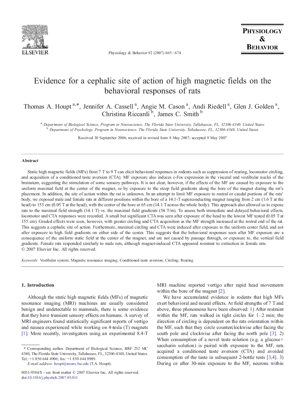 Evidence for a cephalic site of action of high magnetic fields on the behavioral responses of rats