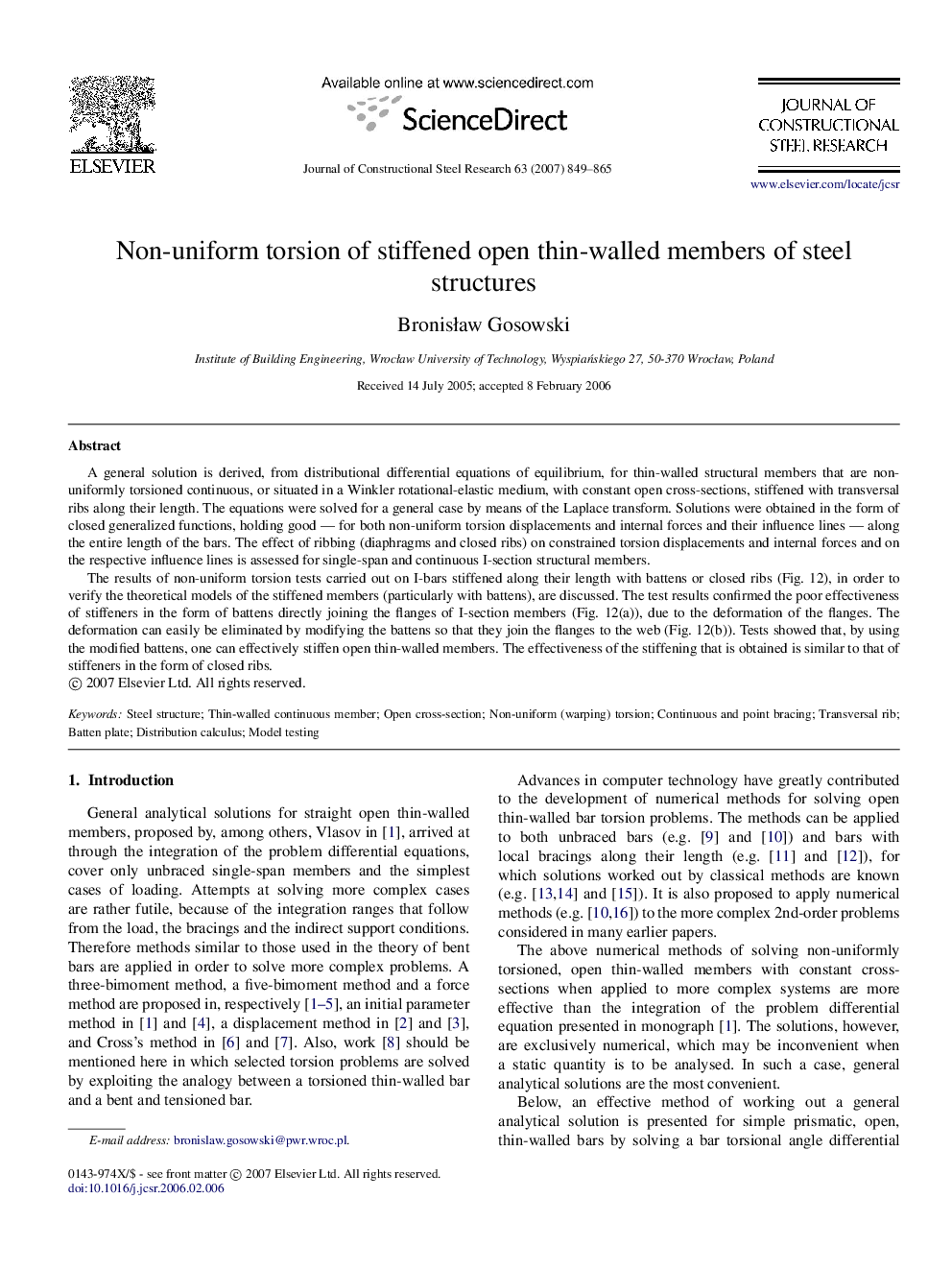 Non-uniform torsion of stiffened open thin-walled members of steel structures