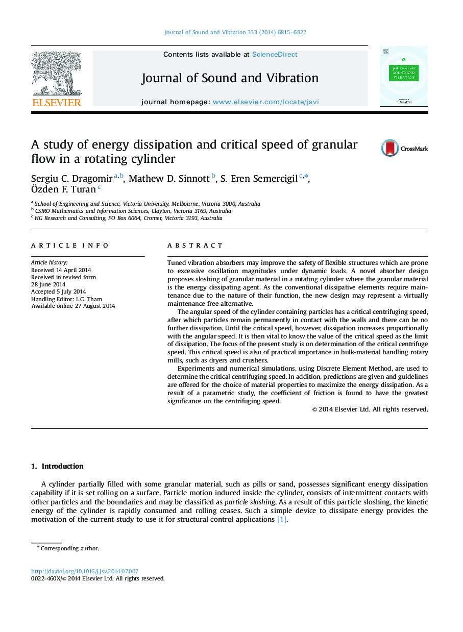 A study of energy dissipation and critical speed of granular flow in a rotating cylinder