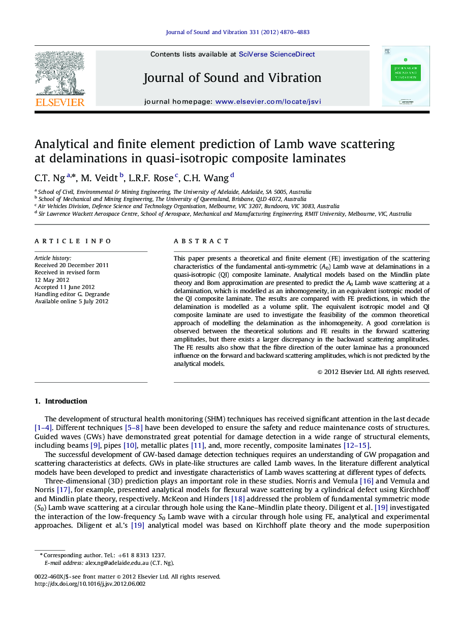 Analytical and finite element prediction of Lamb wave scattering at delaminations in quasi-isotropic composite laminates