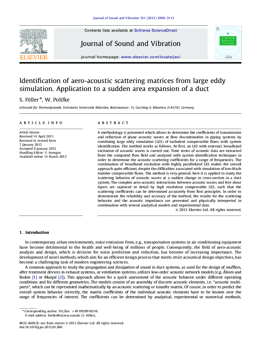 Identification of aero-acoustic scattering matrices from large eddy simulation. Application to a sudden area expansion of a duct