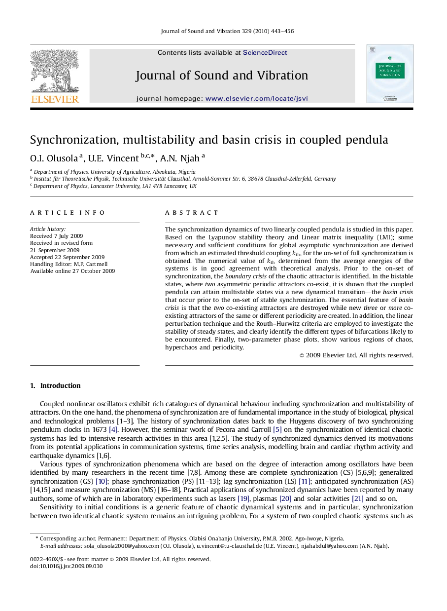 Synchronization, multistability and basin crisis in coupled pendula
