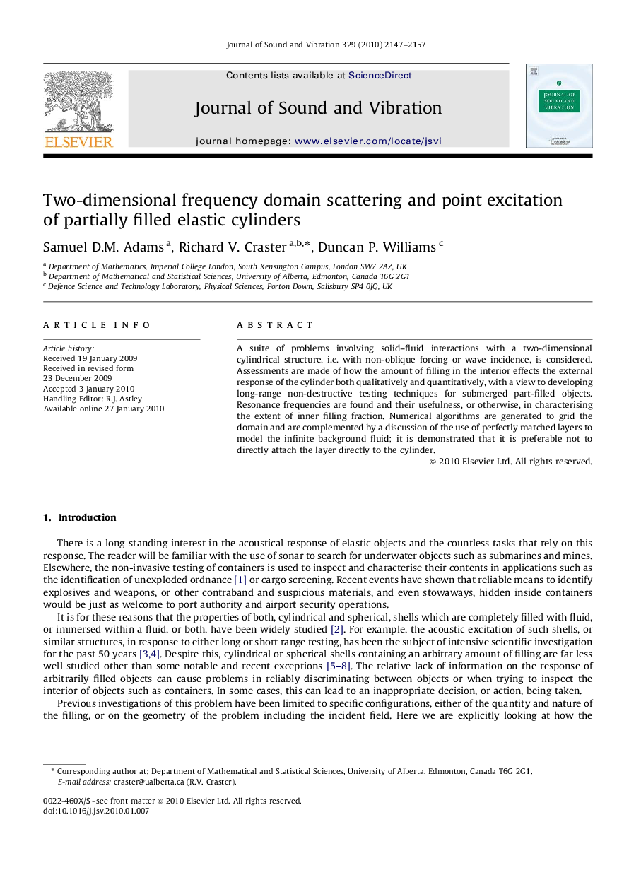 Two-dimensional frequency domain scattering and point excitation of partially filled elastic cylinders