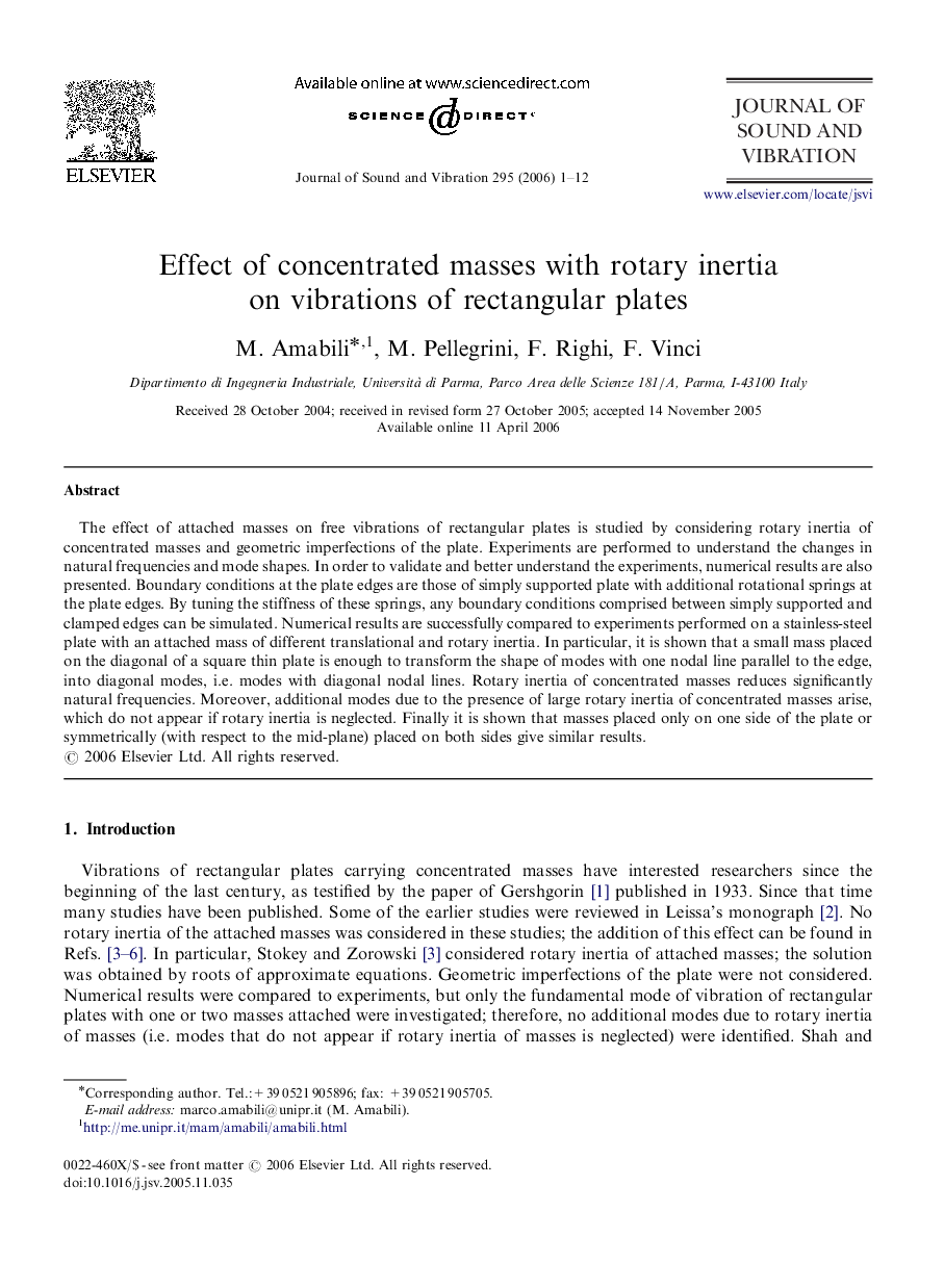 Effect of concentrated masses with rotary inertia on vibrations of rectangular plates
