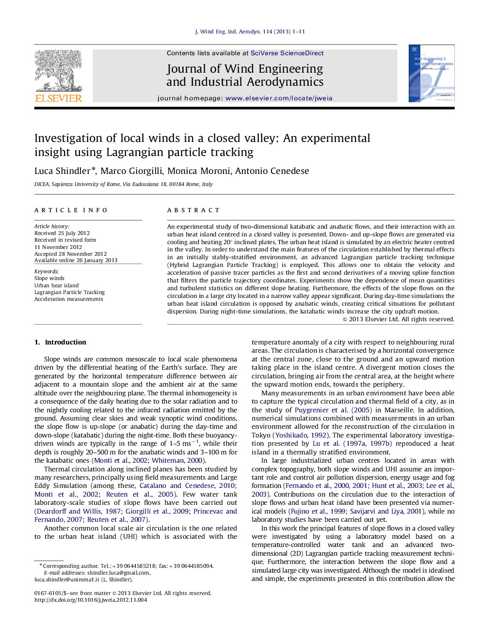 Investigation of local winds in a closed valley: An experimental insight using Lagrangian particle tracking