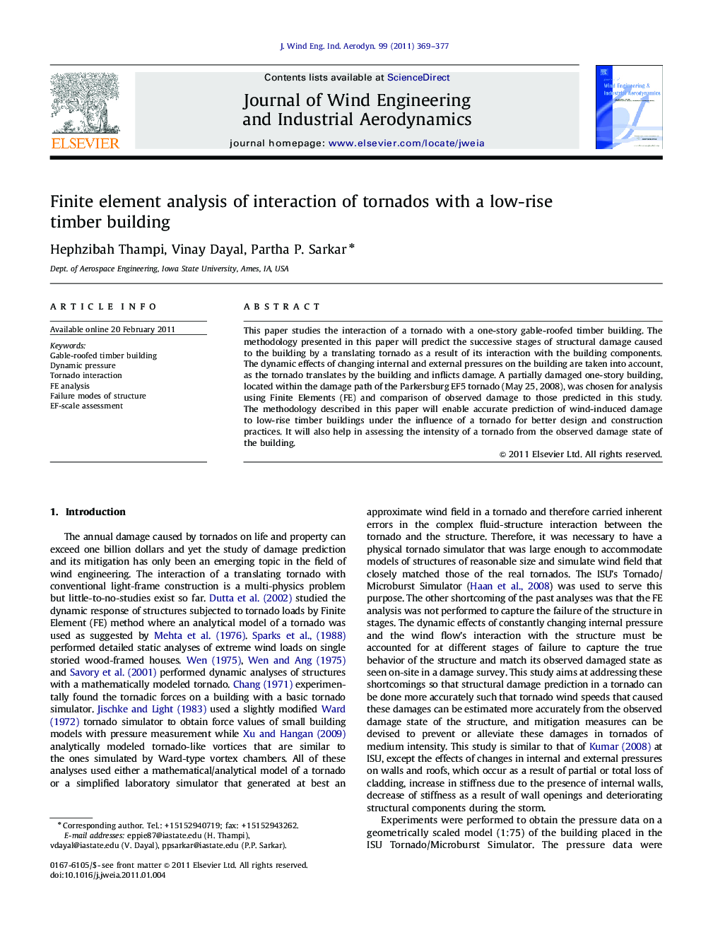 Finite element analysis of interaction of tornados with a low-rise timber building