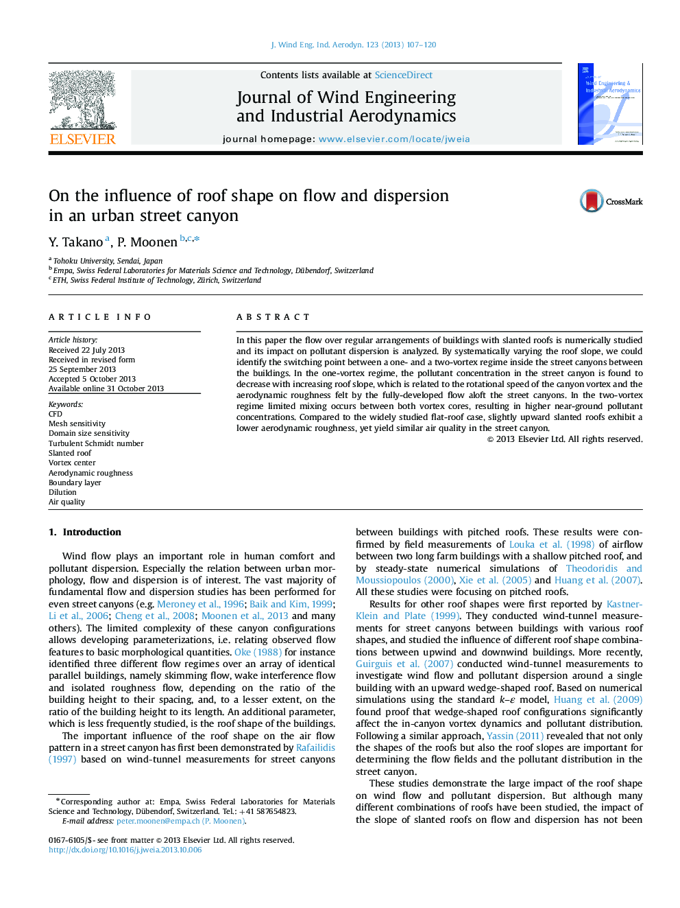 On the influence of roof shape on flow and dispersion in an urban street canyon