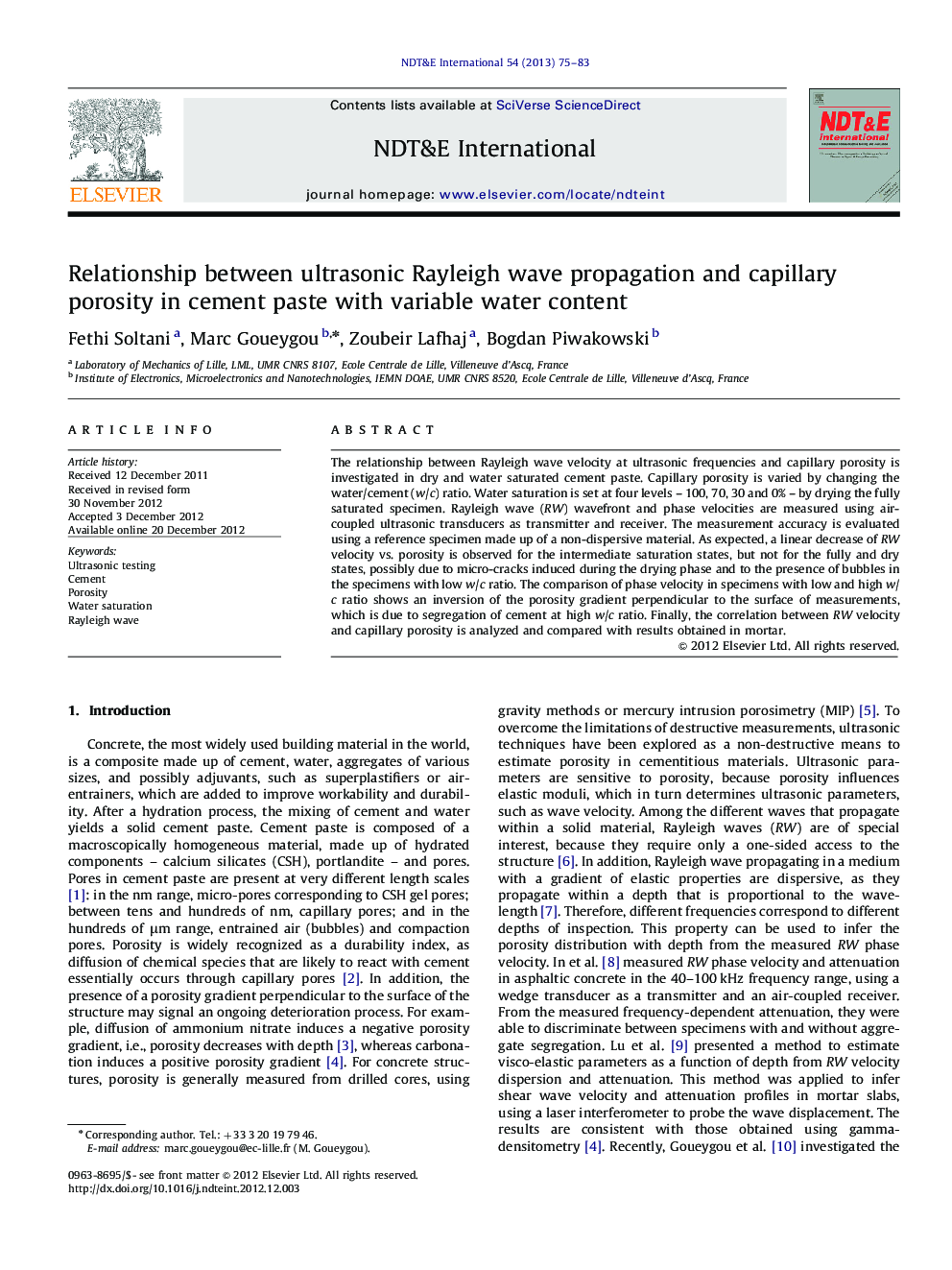 Relationship between ultrasonic Rayleigh wave propagation and capillary porosity in cement paste with variable water content