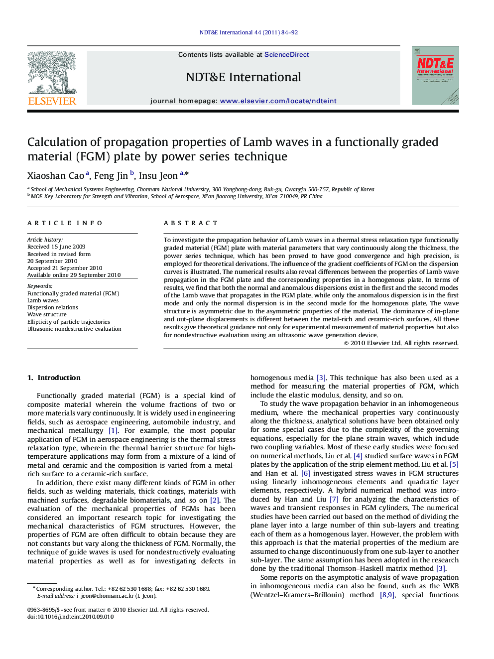 Calculation of propagation properties of Lamb waves in a functionally graded material (FGM) plate by power series technique