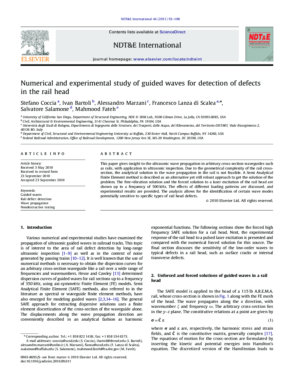 Numerical and experimental study of guided waves for detection of defects in the rail head