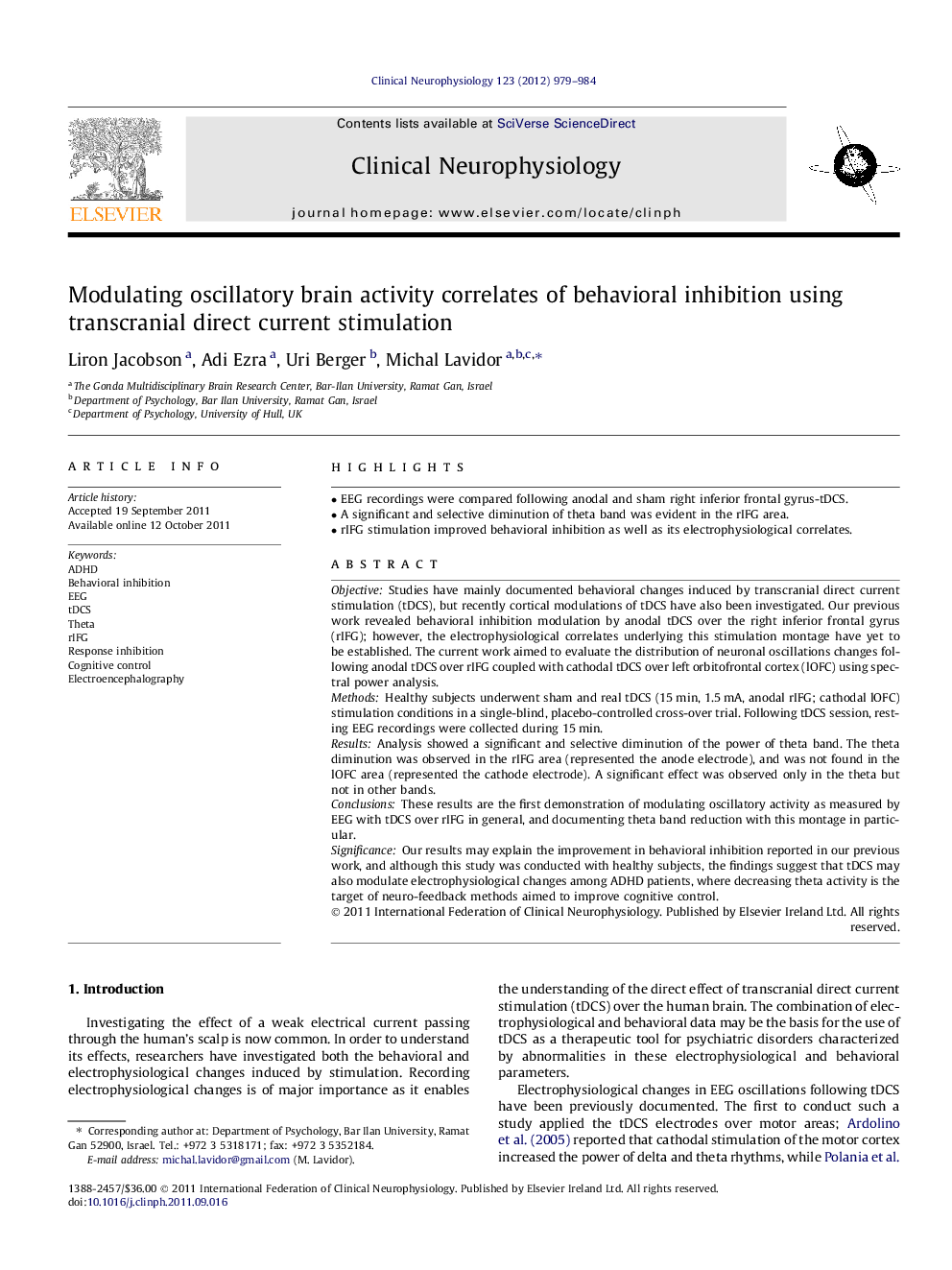 Modulating oscillatory brain activity correlates of behavioral inhibition using transcranial direct current stimulation