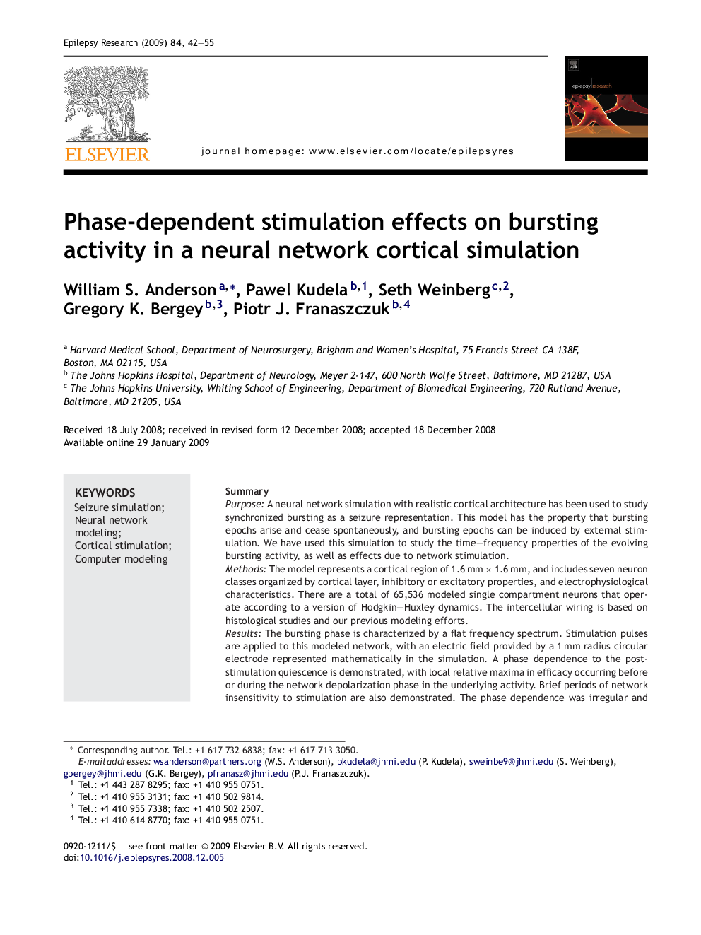 Phase-dependent stimulation effects on bursting activity in a neural network cortical simulation