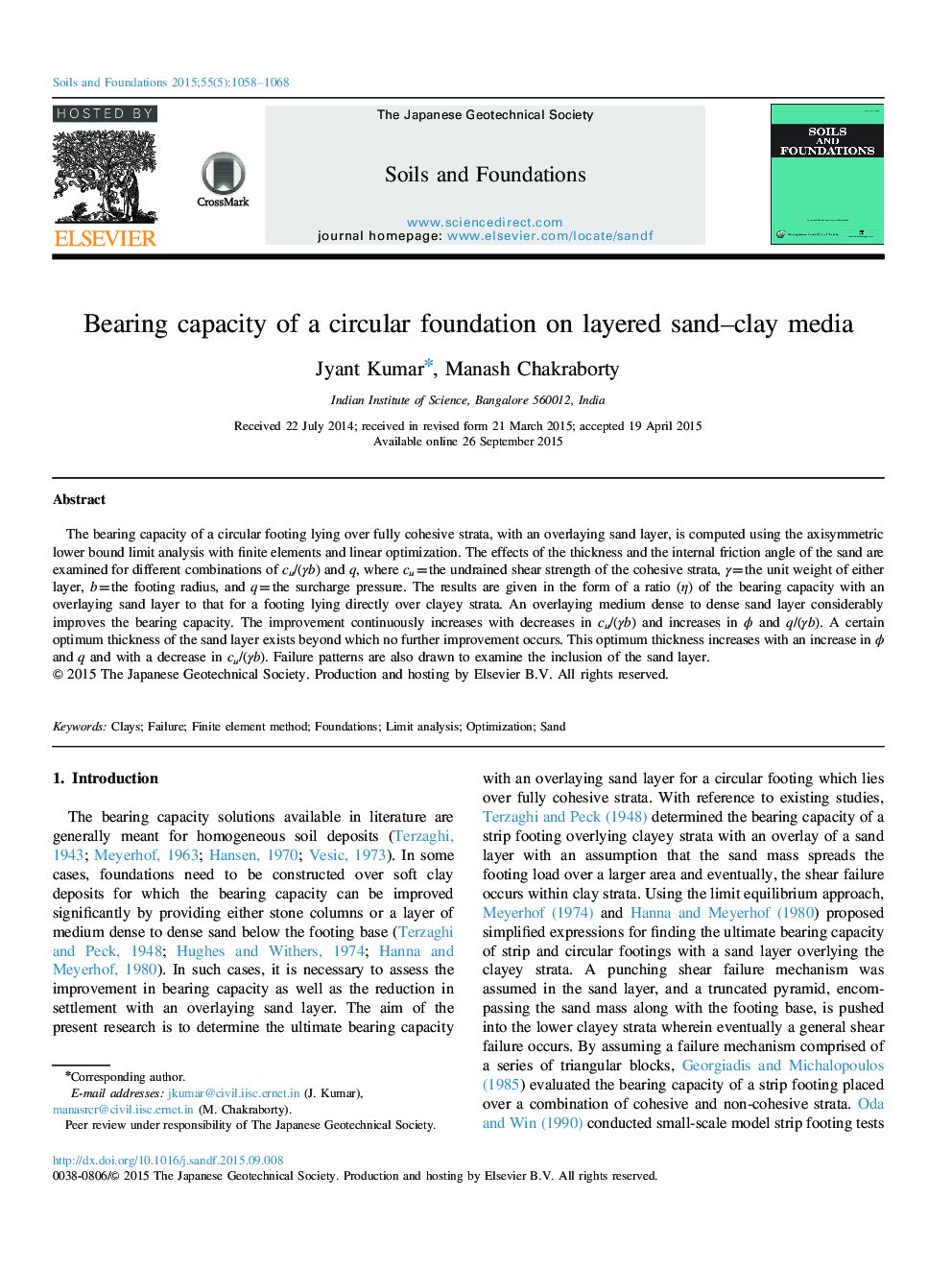 Bearing capacity of a circular foundation on layered sand-clay media