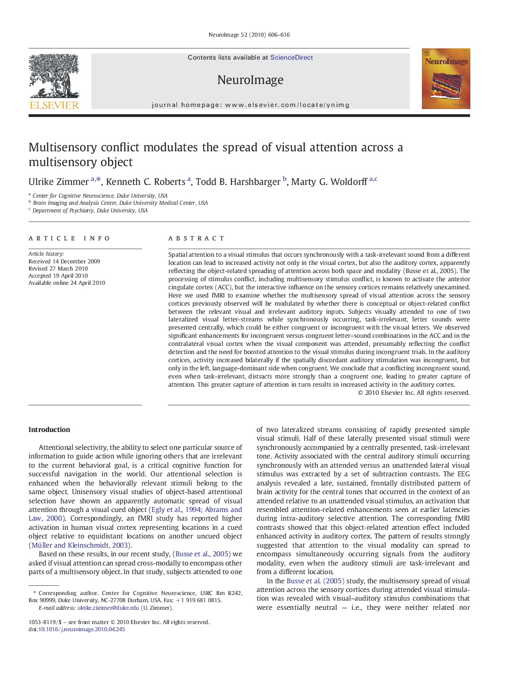 Multisensory conflict modulates the spread of visual attention across a multisensory object