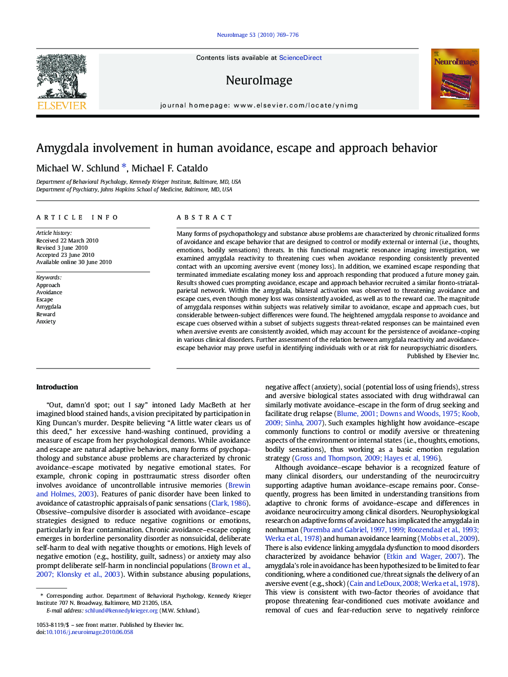 Amygdala involvement in human avoidance, escape and approach behavior