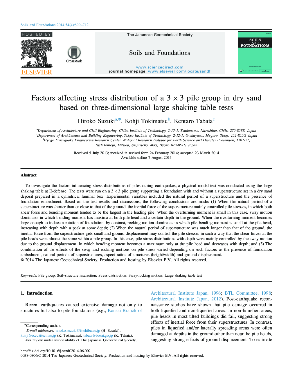 Factors affecting stress distribution of a 3×3 pile group in dry sand based on three-dimensional large shaking table tests 