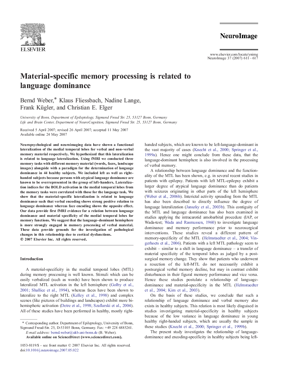 Material-specific memory processing is related to language dominance