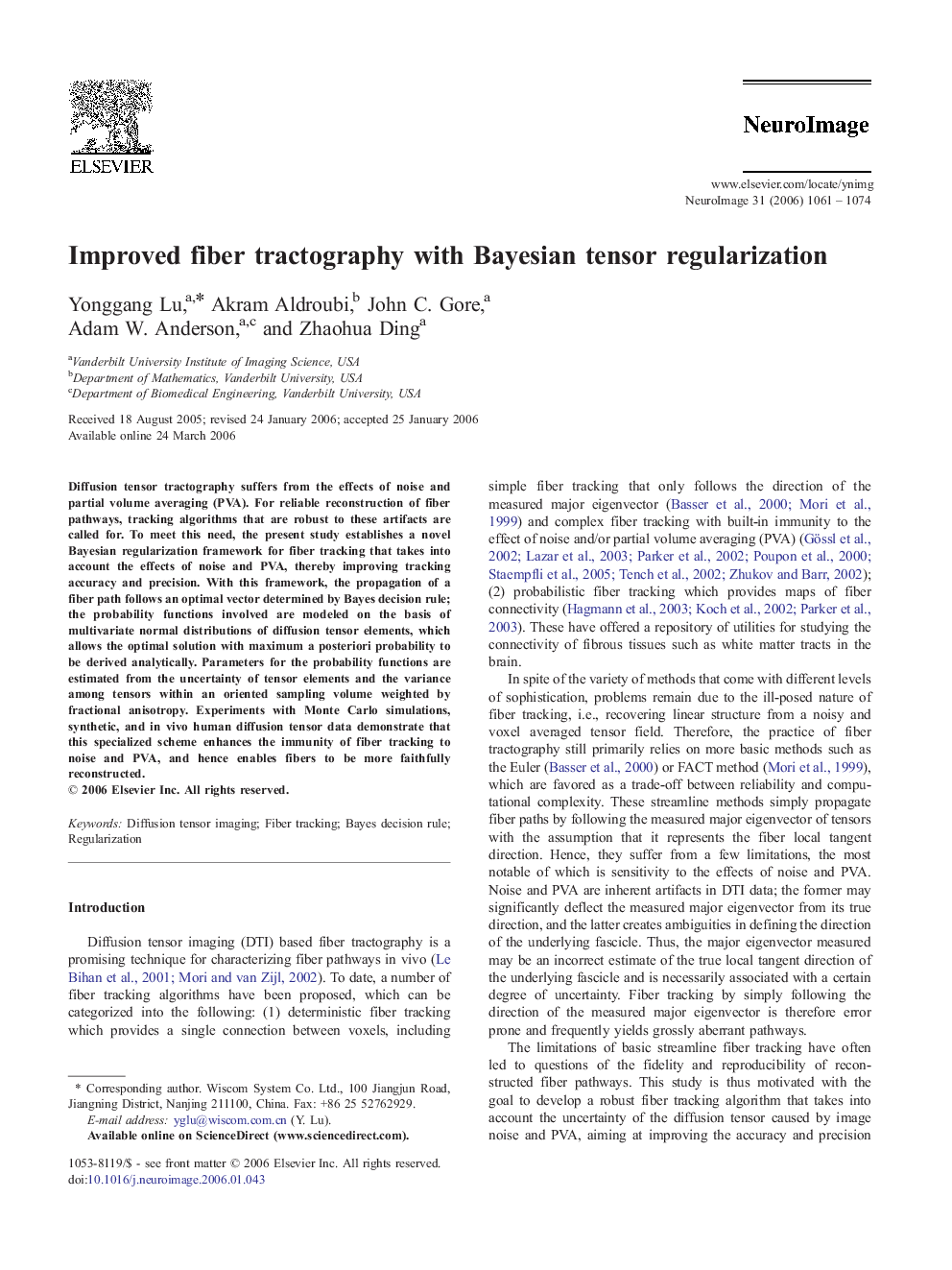 Improved fiber tractography with Bayesian tensor regularization