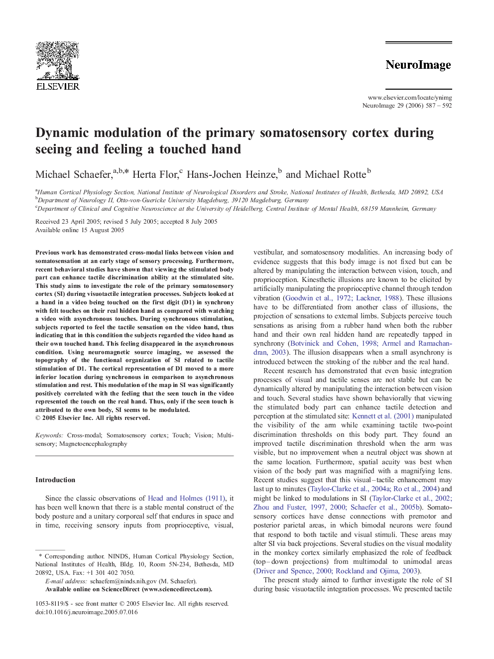 Dynamic modulation of the primary somatosensory cortex during seeing and feeling a touched hand