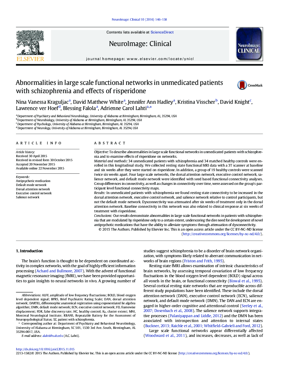 Abnormalities in large scale functional networks in unmedicated patients with schizophrenia and effects of risperidone