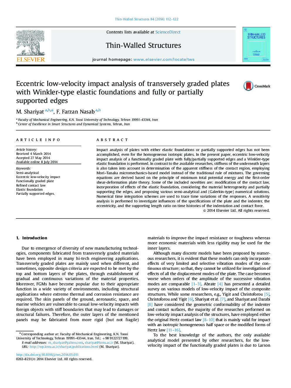 Eccentric low-velocity impact analysis of transversely graded plates with Winkler-type elastic foundations and fully or partially supported edges