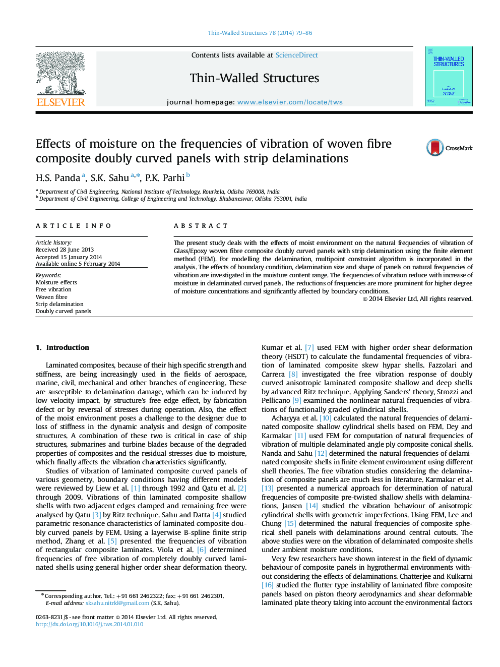 Effects of moisture on the frequencies of vibration of woven fibre composite doubly curved panels with strip delaminations